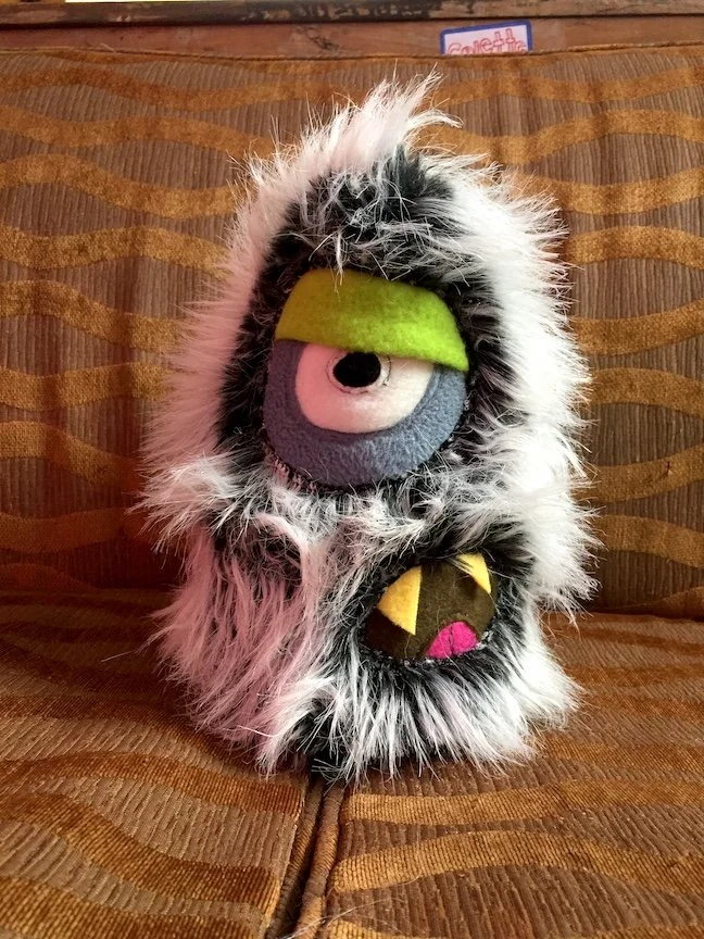 MEDIUM BLACK AND WHITE MONSTER WITH ONE SLEEPY EYE — TIM MONSTERS! -